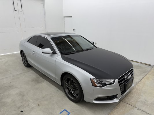 2013 Audi A5 | Hood Wrap - This 2013 Audi A5 was already a great looking car but to elevate the look even more, the customer went with an Avery Dennison Matte Black hood wrap. 2013 Audi A5 | Hood Wrap - This 2013 Audi A5 was already a great looking car but to elevate the look even more, the customer went with an Avery Dennison Matte Black hood wrap.