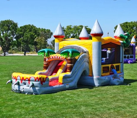 Lets Bounce t-rex - If you're looking for a way to make your little one's next birthday memorable, Rent a T-Rex Dinosaur Moonwalk. This bounce house and slide combination gives them and their friends more than one way to climb around and play, and it fits perfectly into any T-Rex dinosaur-themed birthday party.
