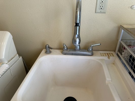 Laundry room faucet replacement - Customer purchased a new laundry sink faucet that needed to be installed.