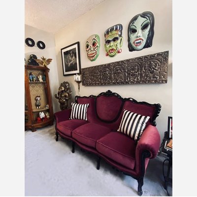 Sofa re-upholstery - Our clients wanted to transform this old Victorian sofa into a goth style sofa. We painted the frame black, completely replaced all the materials and upholstered it in commercial grade velvet.