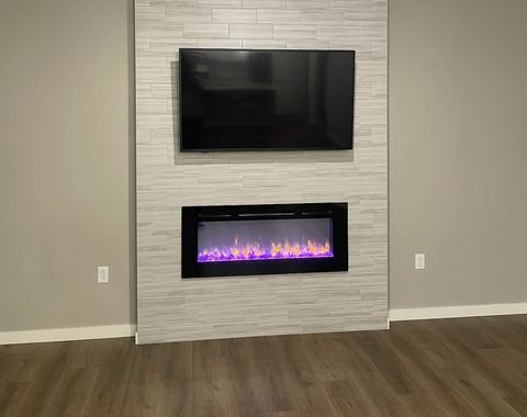 Tile mount - 65" Tile mount above a fire place with wires Cancelled. Tile mount - 65" Tile mount above a fire place with wires Cancelled.