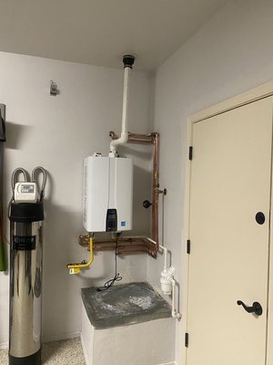 Navien Tankless Water Heater Upgrade - This McKinney homeowner wanted to free up space in their garage and save on energy bills. After a walkthrough and consultation, we helped them choose a Navien tankless system that could meet their family's high hot water demand.
We removed the bulky old tank heater, reconfigured the gas and vent lines, and completed the flush valve installation for easy future servicing. The result? Unlimited hot water, lower utility costs, and a cleaner look inside the home.
They were thrilled to enjoy endless showers — just in time for guests visiting that weekend! Navien Tankless Water Heater Upgrade - This McKinney homeowner wanted to free up space in their garage and save on energy bills. After a walkthrough and consultation, we helped them choose a Navien tankless system that could meet their family's high hot water demand.
We removed the bulky old tank heater, reconfigured the gas and vent lines, and completed the flush valve installation for easy future servicing. The result? Unlimited hot water, lower utility costs, and a cleaner look inside the home.
They were thrilled to enjoy endless showers — just in time for guests visiting that weekend!