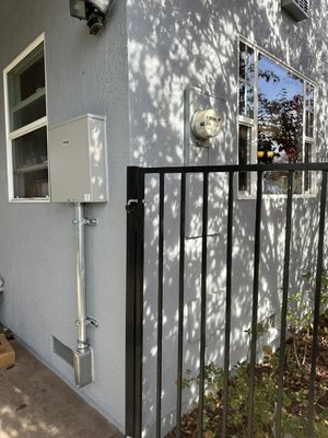 Manual Transfer Switch - A manual transfer switch backup power installation typically involves connecting a generator to your electrical system. The transfer switch allows you to manually switch between the utility power and the generator power, ensuring a seamless transition during power outages. It includes a main service disconnect, breaker panel, and wiring to essential circuits. Installation involves positioning the transfer switch, connecting it to the utility meter, installing the generator input, and connecting circuits you want powered during an outage. Call our Professional electricians to handle such installations for safety and compliance. Manual Transfer Switch - A manual transfer switch backup power installation typically involves connecting a generator to your electrical system. The transfer switch allows you to manually switch between the utility power and the generator power, ensuring a seamless transition during power outages. It includes a main service disconnect, breaker panel, and wiring to essential circuits. Installation involves positioning the transfer switch, connecting it to the utility meter, installing the generator input, and connecting circuits you want powered during an outage. Call our Professional electricians to handle such installations for safety and compliance.