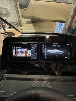 SeaRay Video Integration - Our customer wanted a camera integrated into the Simrad helm on his new SeaRay Surf. Since we are fully Navico trained, we are well-versed in Simrad, Lowrance, and B&G systems. The result is a great user experience, and we added an onboard two-stage air pump for water toys to boot! SeaRay Video Integration - Our customer wanted a camera integrated into the Simrad helm on his new SeaRay Surf. Since we are fully Navico trained, we are well-versed in Simrad, Lowrance, and B&G systems. The result is a great user experience, and we added an onboard two-stage air pump for water toys to boot!