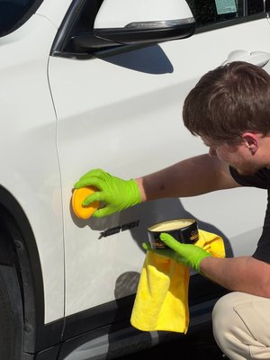Hard Wax Protection Servise - This service includes a full detailing exterior wash of your vehicle, along with the removal of tar, road grime, and brake dust.
We then apply a high-quality hard wax that encharces your vehicle's shine and brings out deeper, richer color.
The result is a smooth, glossy finish with added hydrophobic protection that helps repel water, dirt, and contaminants — keeping your car cleaner for longer. Hard Wax Protection Servise - This service includes a full detailing exterior wash of your vehicle, along with the removal of tar, road grime, and brake dust.
We then apply a high-quality hard wax that encharces your vehicle's shine and brings out deeper, richer color.
The result is a smooth, glossy finish with added hydrophobic protection that helps repel water, dirt, and contaminants — keeping your car cleaner for longer.