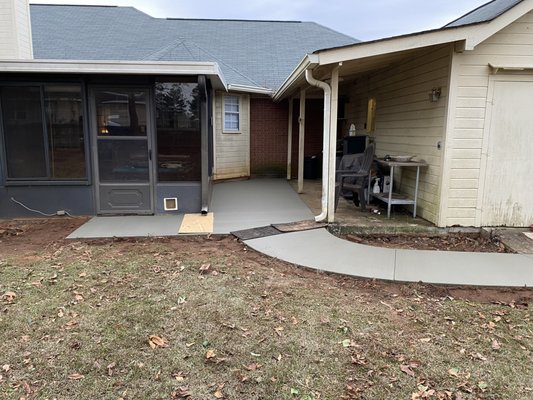 Concrete patio/sidewalk - Owner wanted muddy area between screened in patio and other concrete pad formed and finished. He also wanted another sidewalk.