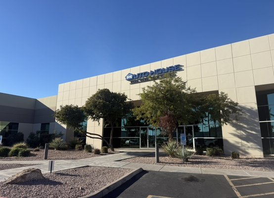 Auto House Dealership - Artificial Turf - This was done during December 2025. We installed artificial turf called TH Blend at a car dealership. This ground was cleaned and brushed before glue was applied. Once set, the turf was rolled to ensure the glue spread evenly out.