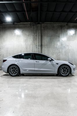 2022 Tesla Model 3 with Inozetek wrap. - This Model 3 was wrapped with Inozetek Chalk Gray. We applied two layers of ceramic coating for ease of maintenance from daily driven. We also applied Madico Winco Ceramic tint with 45% front windshield and sunroof, 35% on the sides and 20% for the back glass. 2022 Tesla Model 3 with Inozetek wrap. - This Model 3 was wrapped with Inozetek Chalk Gray. We applied two layers of ceramic coating for ease of maintenance from daily driven. We also applied Madico Winco Ceramic tint with 45% front windshield and sunroof, 35% on the sides and 20% for the back glass.