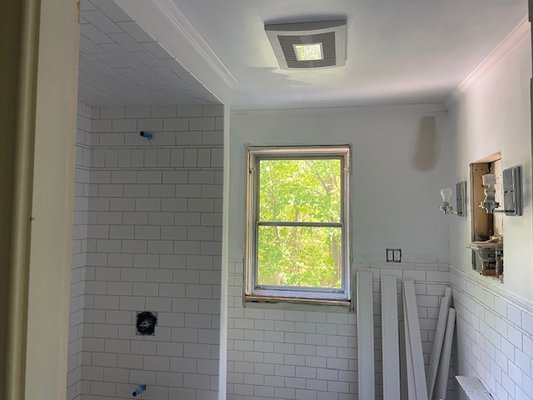 Bathroom Remodel - Historic Bathroom Renovation – 1850 Home
This was a full gut renovation in an 1850 house. We restored the structural integrity of the space by repairing the original framing and properly insulating throughout. To preserve the home's classic charm, we installed a new cast iron tub and wrapped it in a full subway tile enclosure, including the ceiling. The space was finished with a clean chair rail detail around the walls—blending old-world character with solid craftsmanship. Bathroom Remodel - Historic Bathroom Renovation – 1850 Home
This was a full gut renovation in an 1850 house. We restored the structural integrity of the space by repairing the original framing and properly insulating throughout. To preserve the home's classic charm, we installed a new cast iron tub and wrapped it in a full subway tile enclosure, including the ceiling. The space was finished with a clean chair rail detail around the walls—blending old-world character with solid craftsmanship.