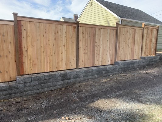 New fence installation - New retaining wall installed on top of that we installed Standard fence design for privacy of backyard. New fence installation - New retaining wall installed on top of that we installed Standard fence design for privacy of backyard.