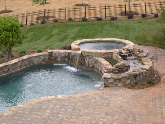 Dream it - Pool features are what allow you to customize your new pool. The right selection of lights and water features can transform your new pool into a relaxing oasis or a kid’s paradise.If you’re not sure where to start, or have questions about custom pool features, our design consultants are here to help. Dream it - Pool features are what allow you to customize your new pool. The right selection of lights and water features can transform your new pool into a relaxing oasis or a kid’s paradise.If you’re not sure where to start, or have questions about custom pool features, our design consultants are here to help.