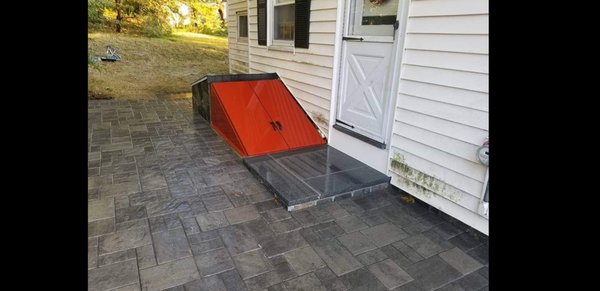 Driveway. Pavers. Bulkhead. - The shiny red bulkhead was the cherry on top. New Driveway with granite pavers. Fab! Driveway. Pavers. Bulkhead. - The shiny red bulkhead was the cherry on top. New Driveway with granite pavers. Fab!
