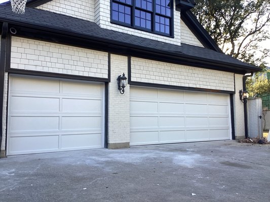 White Recessed Panel Garage Door - What a beautiful install! This customer chose the Recessed Panel garage door. This style is a great choice if you're looking to mimic the look of the older wooden doors, without all of the maintenance that comes along with them! The high contrast of black and white makes for an outstanding view! Ready for your upgrade? Contact us today for your free on-site estimate with one of our Certified Service Professionals! You can reach us at (972)-422-1695 or Planooverhead.com/contact-us/ White Recessed Panel Garage Door - What a beautiful install! This customer chose the Recessed Panel garage door. This style is a great choice if you're looking to mimic the look of the older wooden doors, without all of the maintenance that comes along with them! The high contrast of black and white makes for an outstanding view! Ready for your upgrade? Contact us today for your free on-site estimate with one of our Certified Service Professionals! You can reach us at (972)-422-1695 or Planooverhead.com/contact-us/