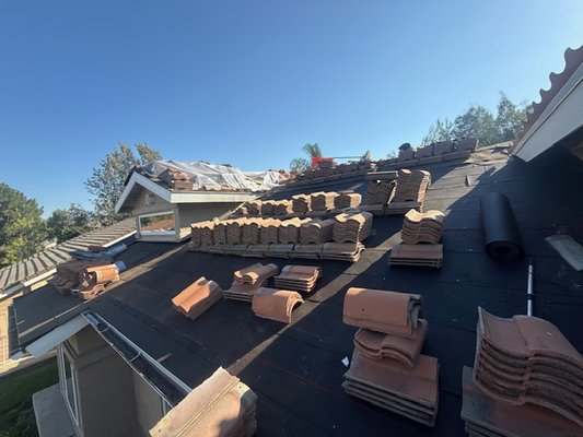 Roof Relay - Another successful roof relay by McKay's Roofing. We re-installed all the original tiles perfectly, providing this home with a 'like-new' roof's protection at a fraction of the cost. A smart, durable, and cost-effective repair. Roof Relay - Another successful roof relay by McKay's Roofing. We re-installed all the original tiles perfectly, providing this home with a 'like-new' roof's protection at a fraction of the cost. A smart, durable, and cost-effective repair.
