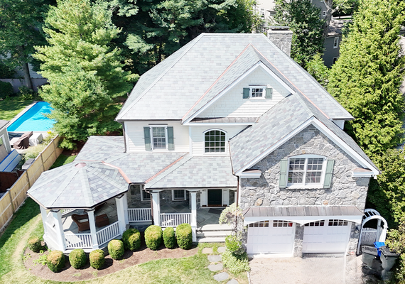 Wood Shingle to Stone & New Roof: Before & After in Greenwich - We recently completed a breathtaking full exterior renovation project on a residential property in Greenwich, CT, featuring an incredible before and after transformation.
The home's previous exterior featured a worn-out wood shingle shake roof. Our expert team completely stripped away the old materials and executed a full roof replacement alongside stunning new stone installation, redefining the property's look and protection.

Our process for this project included:

1. Complete Tear-Off: Safe removal of the old wood shake roofing and preparation of the underlying structure.

2. Expert Roof & Stone Installation: Meticulous installation of a high-performance roofing system paired with premium architectural stone masonry.

3. Curb Appeal & Long-Term Durability: We upgraded the property from aging wood into a sleek, weather-resistant combination of stone and a new roof that drastically boosts aesthetic value.

Check out the photos to see the dramatic before and after transformation of this Greenwich home!
Looking to upgrade your property with custom stonework and a new roof? Get in touch with GA Castro Construction today!