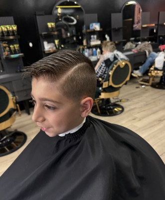 Kids Haircut - We enjoy seeing kids leave the chair feeling their very best and confident! Kids Haircut - We enjoy seeing kids leave the chair feeling their very best and confident!