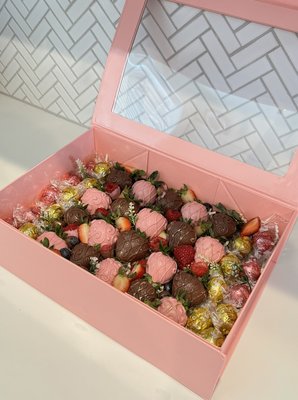 Gourmet chocolate covered strawberries - Grama traffic covered strawberries using our Belgium chocolate! Strawberry start at $50 a dozen and increase based on design!
