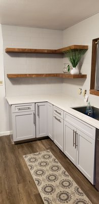 Old Sunnyside - This was a remodel of an older home in the Sunnyside neighborhood in Fresno. It still had the original cabinets.
see before and after pictures below
We reconfigured the kitchen a bit along with an extra full height storage cabinet, we not only updated the kitchen but we maximized the storage and efficiency of this kitchen
Shaker door with a light blue/grey paint. White Quartz countertop and white subway tile backsplash
Optional items:
- built in double trash unit
- Alder custom corner floating shelves
- lazy susan corner base cabinet
- custom angled broom closet Old Sunnyside - This was a remodel of an older home in the Sunnyside neighborhood in Fresno. It still had the original cabinets.
see before and after pictures below
We reconfigured the kitchen a bit along with an extra full height storage cabinet, we not only updated the kitchen but we maximized the storage and efficiency of this kitchen
Shaker door with a light blue/grey paint. White Quartz countertop and white subway tile backsplash
Optional items:
- built in double trash unit
- Alder custom corner floating shelves
- lazy susan corner base cabinet
- custom angled broom closet
