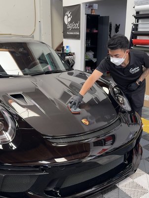 Ceramic Coating Paint Protection - Ceramic coating is a revolutionary solution for those who want to enhance and protect the finish of their vehicle. Here are some of the top benefits to highlight:

1. Exceptional Protection: Ceramic coatings create a durable, transparent layer over your vehicle's paint, providing superior protection against scratches, swirl marks, bird droppings, tree sap, UV rays, and other environmental contaminants. This helps to maintain the pristine condition of your car's paint for years to come.

2. Long-Lasting Shine: Ceramic coatings offer a deep, glossy finish that enhances the appearance of your vehicle and gives it a showroom-quality shine. Unlike traditional waxes and sealants, ceramic coatings can last for several years, providing long-lasting beauty and protection.

3. Easy Maintenance: One of the most significant benefits of ceramic coatings is their low-maintenance nature. The hydrophobic properties of ceramic coatings repel water, dirt, and grime, making it easier to clean your car and reducing the frequency of car washes. This saves you time and effort in maintaining your vehicle's appearance.

4. UV Protection: Ceramic coatings provide excellent UV resistance, preventing the sun's harmful rays from fading or oxidizing your car's paint over time. This helps to preserve the color and shine of your vehicle, keeping it looking newer for longer.

5. Chemical Resistance: Ceramic coatings form a strong bond with the surface of your vehicle, creating a barrier that is highly resistant to chemicals such as acidic rain, bug splatter, and harsh cleaning agents. This helps to prevent etching and staining, keeping your car's paint looking flawless.

6. Enhanced Gloss and Depth: Ceramic coatings enhance the depth and clarity of your vehicle's paint, giving it a rich, glossy finish that is sure to turn heads. Whether you're driving in the sunlight or under artificial lighting, your car will look stunning from every angle.

7. Heat Resistance: Ceramic coatings can withstand high temperatures, making them ideal for protecting your vehicle's paint from heat-related damage such as fading or cracking. This is especially important for cars that are regularly exposed to intense sunlight or hot weather conditions.

8. Increased Resale Value: A well-maintained vehicle with a ceramic coating is more attractive to potential buyers and can command a higher resale price. The long-lasting protection and enhanced appearance provided by ceramic coatings make them a wise investment for preserving the value of your car.

Overall, ceramic coatings offer unbeatable protection, durability, and aesthetics, making them a top choice for car enthusiasts who want to keep their vehicles looking their best for years to come.