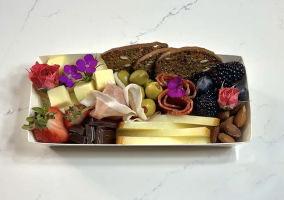 Boxes - Introducing our exquisite Charcuterie Box Experience! Elevate your gatherings and events with the perfect fusion of art and flavor. Our handcrafted boxes are a culinary masterpiece, carefully curated to tantalize your taste buds and wow your guests. Each element on our box is selected with precision and presented with elegance. You'll find an array of cheeses, delectable charcuterie, fresh fruits, artisanal crackers, and an assortment of delightful dips and condiments. From savory to sweet, our charcuterie box offers a symphony of flavors that cater to every palate. Boxes - Introducing our exquisite Charcuterie Box Experience! Elevate your gatherings and events with the perfect fusion of art and flavor. Our handcrafted boxes are a culinary masterpiece, carefully curated to tantalize your taste buds and wow your guests. Each element on our box is selected with precision and presented with elegance. You'll find an array of cheeses, delectable charcuterie, fresh fruits, artisanal crackers, and an assortment of delightful dips and condiments. From savory to sweet, our charcuterie box offers a symphony of flavors that cater to every palate.
