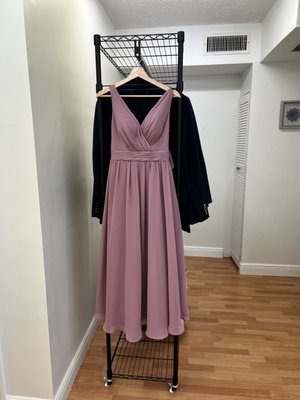 Dress Length - he client needed to shorten her dress, which had 3 layers. It was shortened, and then I carefully and neatly folded the hem. It was finished and presented very well.