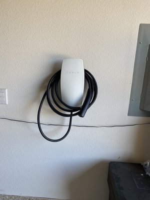 Car charging station installation.￼ - Car charging station installation.