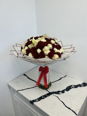 100 red and white  roses - We made this beautiful red and white bouquet at customers request he want to express how his love was true and pure and that is why the white with the red, roses