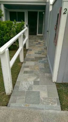 Entry and walkway remodel - This project was done using slightly irregular 12" x 12" slate with variable dimension sizing. it was to exact sizes of full half and quarter, then mosaic pattern installed. Entry and walkway remodel - This project was done using slightly irregular 12" x 12" slate with variable dimension sizing. it was to exact sizes of full half and quarter, then mosaic pattern installed.