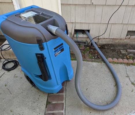 Extracting water from a flooded crawlspace - We responded to a flooded crawlspace. We started by drying out the crawlspace. Then we located any areas of the structure that were saturated and removed any water damage.
