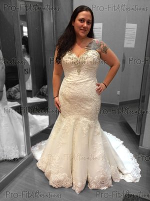 Sweetheart Mermaid Wedding Dress - We did a couple alterations to her wedding dress by taking-in both sides from her bust to her waist. We shortened the bottom of her hem with the lace trim. And also added a bustle, giving her the freedom to move around freely without having to change out of this beautiful dress on her special day. Sweetheart Mermaid Wedding Dress - We did a couple alterations to her wedding dress by taking-in both sides from her bust to her waist. We shortened the bottom of her hem with the lace trim. And also added a bustle, giving her the freedom to move around freely without having to change out of this beautiful dress on her special day.