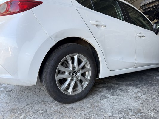 MAZDA Quarter/Door REPAIR - This customer arrived with a damaged quarter panel and door. We immediately took action by completing metal work - to maximize perfection, and minimal filler. Ultimately achieving a flawless repair. Customer left very happy.