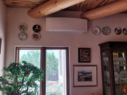 Ductless Mini Split Installation - This installation included the Daikin MXL series low ambient / high capacity outdoor heat pump, and both the Daikin Emura and Daikin 17 Series indoor high wall units.
Daikin Emura was designed to perfectly balance technological leadership and the beauty of aerodynamics. The next generation of home air conditioning is here, offering smart technology within a sleek, curved silhouette.
Daikin's multi-zone heat pump systems are ideal for multi-room applications desiring individual room comfort in a space-saving design, with the ability to connect up to eight indoor units to a single outdoor unit. Systems offer energy efficiency levels up to 20 SEER2 and 9.7 HSPF2 for enhanced home comfort and energy savings. Suitable for both new build and renovation projects, Daikin Multi-Zone Systems are the smart, reliable solution for your home.
Daikin AURORA Multi-Zone systems offer enhanced capacity in cold ambient conditions: Up to 100% heating capacity as low -13°F and up to 100% cooling capacity at 115°F (46°C).
Daikin Inverter Technology - Comfort Without Compromise
Inverter technology helps prevent the common, and uncomfortable, temperature swings normally experienced with non-inverter HVAC systems.
DKN Cloud WiFi Adapter
The DKN Cloud Wi-Fi Adapter enables the remote control of your Daikin indoor units through an iOS/Android App. Ductless Mini Split Installation - This installation included the Daikin MXL series low ambient / high capacity outdoor heat pump, and both the Daikin Emura and Daikin 17 Series indoor high wall units.
Daikin Emura was designed to perfectly balance technological leadership and the beauty of aerodynamics. The next generation of home air conditioning is here, offering smart technology within a sleek, curved silhouette.
Daikin's multi-zone heat pump systems are ideal for multi-room applications desiring individual room comfort in a space-saving design, with the ability to connect up to eight indoor units to a single outdoor unit. Systems offer energy efficiency levels up to 20 SEER2 and 9.7 HSPF2 for enhanced home comfort and energy savings. Suitable for both new build and renovation projects, Daikin Multi-Zone Systems are the smart, reliable solution for your home.
Daikin AURORA Multi-Zone systems offer enhanced capacity in cold ambient conditions: Up to 100% heating capacity as low -13°F and up to 100% cooling capacity at 115°F (46°C).
Daikin Inverter Technology - Comfort Without Compromise
Inverter technology helps prevent the common, and uncomfortable, temperature swings normally experienced with non-inverter HVAC systems.
DKN Cloud WiFi Adapter
The DKN Cloud Wi-Fi Adapter enables the remote control of your Daikin indoor units through an iOS/Android App.