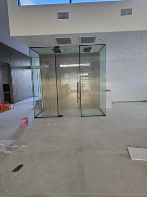 Custom Wine room - This is an example of a 3 glass wall, custom wine room.