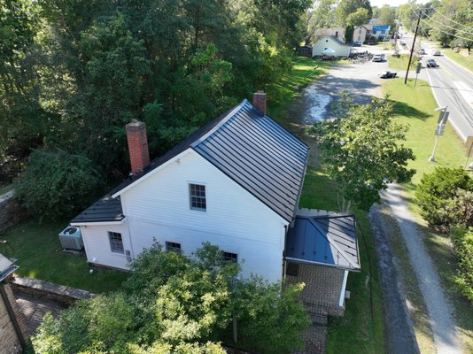 Aldie Mill Black Metal Roof - Here is a before and after of a black metal roof we installed on the Historic Aldie Mill in Aldie, VA.