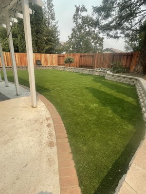 Project - This project took me two weeks I had to level the dirt to put artificial and retaining wall