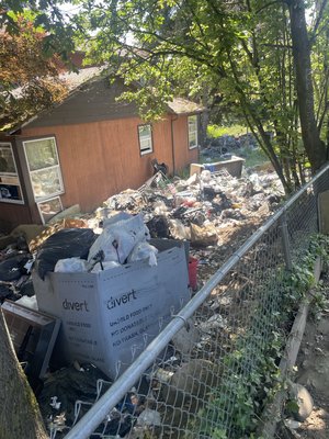 50k Lbs of trash removed from this property! - This job was for a local city. we took out 50,000 pounds of trash, which was a total of 14 of our large dump trailers! 

This job took over three days and was strictly done with an excavator due to the unsanitary debris and drug paraphernalia.