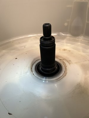 Maytag top loader washer groaning during agitation - Maytag top load washer with groaning transmission during agitation. Had to completely dismantle washer from top and bottom. Removed seized wash plate/ agitator bolt, only to discover a seized wash basket /hub underneath. I was able to remove the wash basket after pounding on the old transmission through a 2x4 wooden post for 45 minutes and applying copious wd 40 onto transmission splines. New transmission went in smoothly and washer sounds like it just left the factory. Maytag top loader washer groaning during agitation - Maytag top load washer with groaning transmission during agitation. Had to completely dismantle washer from top and bottom. Removed seized wash plate/ agitator bolt, only to discover a seized wash basket /hub underneath. I was able to remove the wash basket after pounding on the old transmission through a 2x4 wooden post for 45 minutes and applying copious wd 40 onto transmission splines. New transmission went in smoothly and washer sounds like it just left the factory.