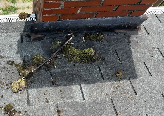 Ben's leak repair and cricket fabication - Ben's house is an older duplex in Elyria, and had developed a leak around the chimney flashing. We discovered this was due to rot in the decking around the base of the chimney. To resolve this issue, we constructed a "cricket". A cricket is a diversionary device built into/onto the roof where water runs down to meet a flat surface such as the side of a chimney. These leak-prone areas need extra help to shed the water and ensure it doesn't pool in dead areas. The leak has now been resolved in a cost-effective way and the homeowner is thrilled we didn't try to pitch them an entire roof job the way the previous two contractors he called did. Every one is happy! Ben's leak repair and cricket fabication - Ben's house is an older duplex in Elyria, and had developed a leak around the chimney flashing. We discovered this was due to rot in the decking around the base of the chimney. To resolve this issue, we constructed a "cricket". A cricket is a diversionary device built into/onto the roof where water runs down to meet a flat surface such as the side of a chimney. These leak-prone areas need extra help to shed the water and ensure it doesn't pool in dead areas. The leak has now been resolved in a cost-effective way and the homeowner is thrilled we didn't try to pitch them an entire roof job the way the previous two contractors he called did. Every one is happy!