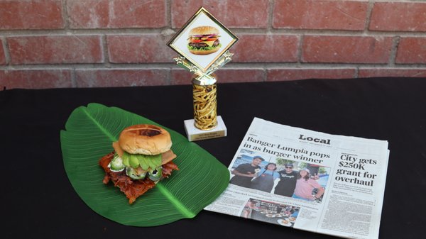 Best Burger In OC 2025 - Banger Lumpia wins judges award for best burger in OC at the Old Towne Orange Burgerfest with the Lumpia Smash burger made cali style with an avocado and jalapeno.