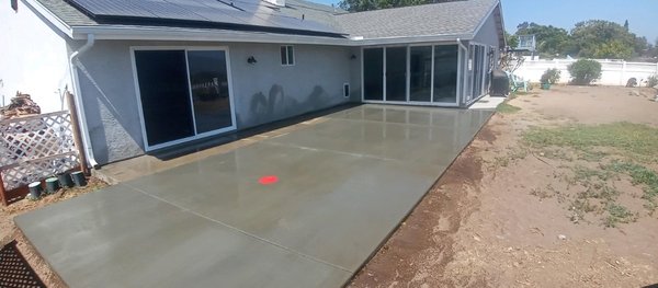 Concrete patio installation - This dirt area was converted in a concrete patio Concrete patio installation - This dirt area was converted in a concrete patio