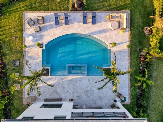 Elevated Spa Retreat - Custom pool and spa in Palm Beach Gardens with glass tile, water sheers, and full automation. Elevated Spa Retreat - Custom pool and spa in Palm Beach Gardens with glass tile, water sheers, and full automation.