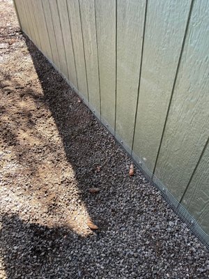 Skunk Exclusion Screening - After excluding and removal of a skunk family, trenched barrier screening was installed to prevent future animal burrowing.