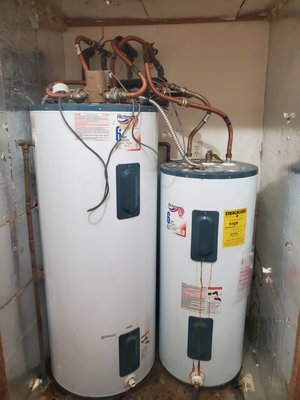 Water heater installation - After the old water heater began leaking, it was time for a replacement. Additionally, a larger storage tank, previously used as part of an old solar water heating system, needed to be removed. A new 40-gallon American Standard water heater was installed in place of the old unit and storage tank, ensuring a more efficient and reliable hot water system.