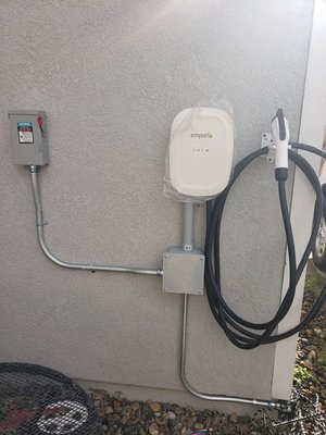 EV Charger Installation - The installation of an electric vehicle (EV) charger marked a forward-thinking upgrade for the home. Seamlessly integrated into the property, the EV charging station not only reflects a commitment to sustainability but also provides the convenience of efficient and eco-friendly transportation, reinforcing the residence as a hub for modern, environmentally conscious living.