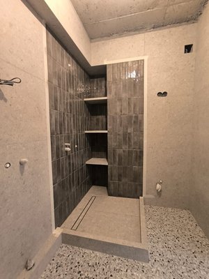 Modern Marble Shower Remodel - This project was in a newly built home. We installed a custom shower cabin finished with new marble and tile work, giving the bathroom a modern and elegant look. Modern Marble Shower Remodel - This project was in a newly built home. We installed a custom shower cabin finished with new marble and tile work, giving the bathroom a modern and elegant look.