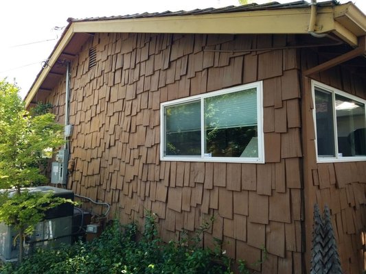 Siding Replacement - The customer wanted a unique update to the original shake siding. They selected an alternating 6" / 8" lap pattern using Sand versus Bronze colors to make it pop! They love the new look and the durability offered with LP SmartSide. Siding Replacement - The customer wanted a unique update to the original shake siding. They selected an alternating 6" / 8" lap pattern using Sand versus Bronze colors to make it pop! They love the new look and the durability offered with LP SmartSide.