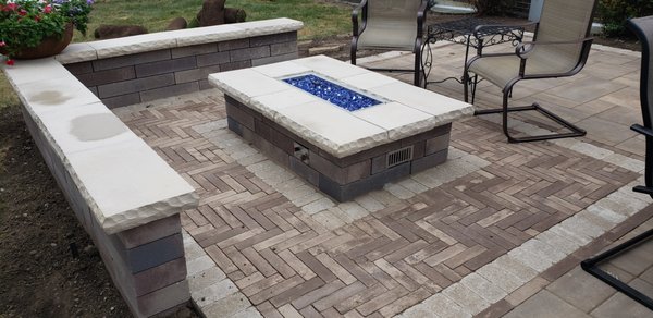 Fire Features - Fire Features add style and warmth to your outdoor space. Prairie Path Group can help design a space that will have you