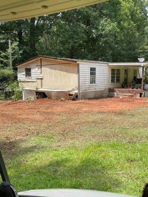 House Remodel - This remodel was done on an old double wide trailer. We cleaned out the house, took down the walls that needed to be replaced and built it up from there. it looks like a brand-new home now. Smart siding was used on this remodel. House Remodel - This remodel was done on an old double wide trailer. We cleaned out the house, took down the walls that needed to be replaced and built it up from there. it looks like a brand-new home now. Smart siding was used on this remodel.