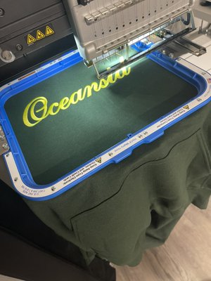 Custom Embroidered Oceanside Hoodies - Our client requested for two custom hoodies to be embroidered for gifts over the holidays. So we ordered, designed and created the two hoodies in one day for a surprise gift.