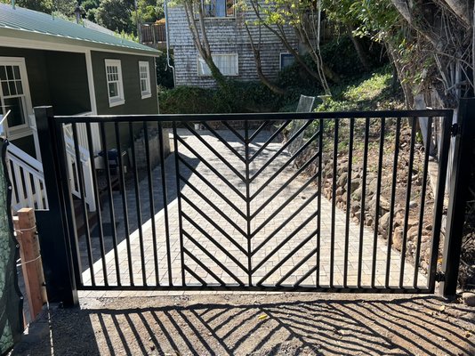 Custom Steel Gate - Our customer took a vacation to Hawaii and saw this exact gate. She loved the design so much that she took a picture of it and asked us to recreate it. This custom steel gate was made with galvanized 1x1 steel pickets and a 2x2 steel frame. We used D&D Technologies Heavy Duty Hinges. Custom Steel Gate - Our customer took a vacation to Hawaii and saw this exact gate. She loved the design so much that she took a picture of it and asked us to recreate it. This custom steel gate was made with galvanized 1x1 steel pickets and a 2x2 steel frame. We used D&D Technologies Heavy Duty Hinges.